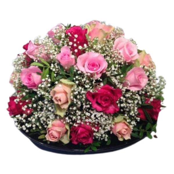 Centerpiece featuring 10 bold red roses, 10 radiant revival pink roses, and 10 soft baby pink roses.