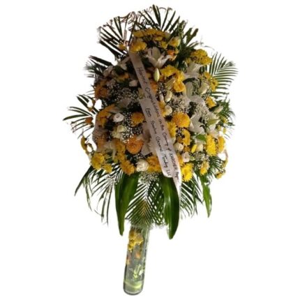 Yellow Delight Stand with yellow chrysanthemums, white lilies, and baby’s breath in a vibrant floral stand for celebrations and special occasions.