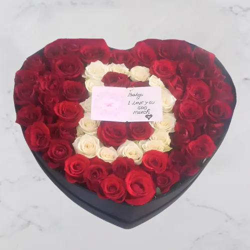 Love Oath Box Dubai – heart-shaped 50 red & white roses with message for birthdays and anniversaries.