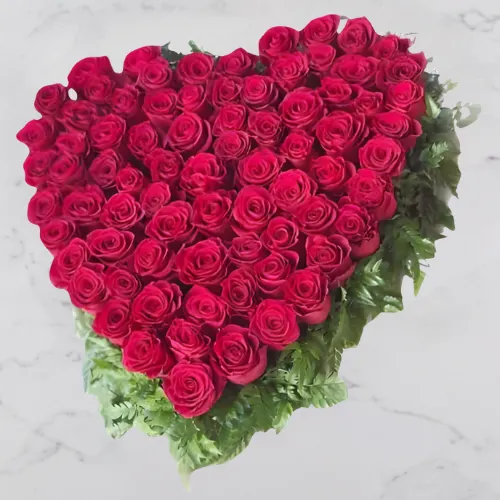 Red Passion Heart Dubai – heart-shaped 75 red roses arrangement for birthdays and anniversaries.