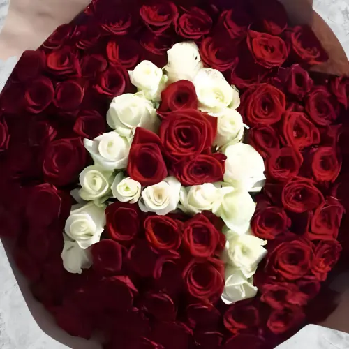 Ruby-Blush Bouquet Dubai – circular 90 red & white roses with ‘A’ for birthdays and anniversaries.