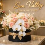 Luxury flower bouquet with premium roses and orchids arranged in a designer box inside Sun Valley Flower Shop Dubai, showcasing elegant floral design and luxury gifting